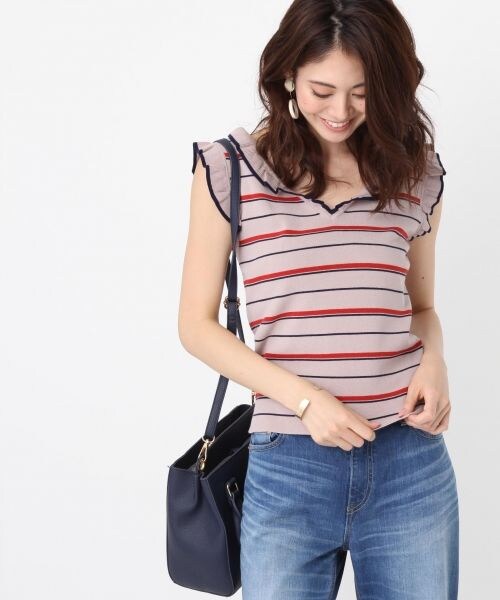 Andemiu（アンデミュウ）の「アクセツキフリルスリーブニット（トップス・アイボリー/ベージュ）」の2枚目の写真