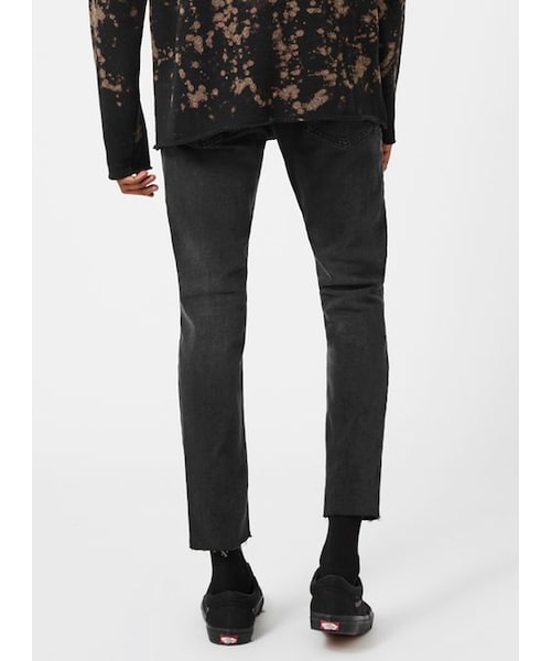 TOPMAN（トップマン）の「Black Ripped Raw Hem Cropped Stretch Skinny Jeans（デニムパンツ・メンズ・Black・28S/34S/28R/30R/32R/34R/38R/32L/34L/36L）」の2枚目の写真