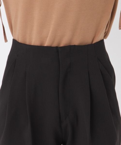 Andemiu（アンデミュウ）の「リボンベルトツキパンツ（パンツ・ブラック/キャメル）」の11枚目の写真