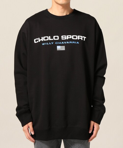 トップス WILLY CHAVARRIA WISM CHOLO SPORTS SWEAT WISM（ウィズム）の「WISM別注 WILLY CHAVAWISM CHOLO SPORTS