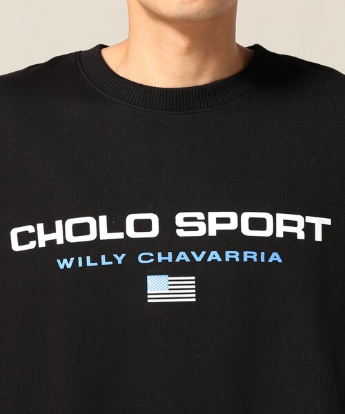 トップス WILLY CHAVARRIA WISM CHOLO SPORTS SWEAT WISM（ウィズム）の「WISM別注 WILLY CHAVAWISM CHOLO SPORTS