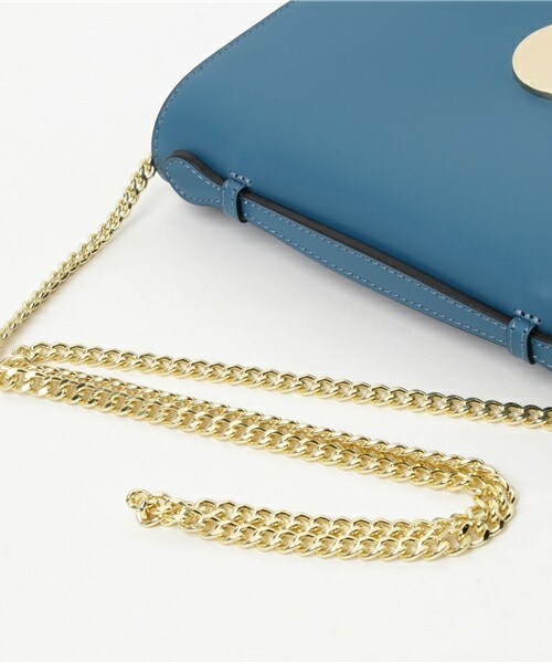 Doux archives（ドゥアルシーヴ）の「金具モチーフBAG（ハンドバッグ・レディース・ブルー/オレンジ・MEDIUM）」の4枚目の写真