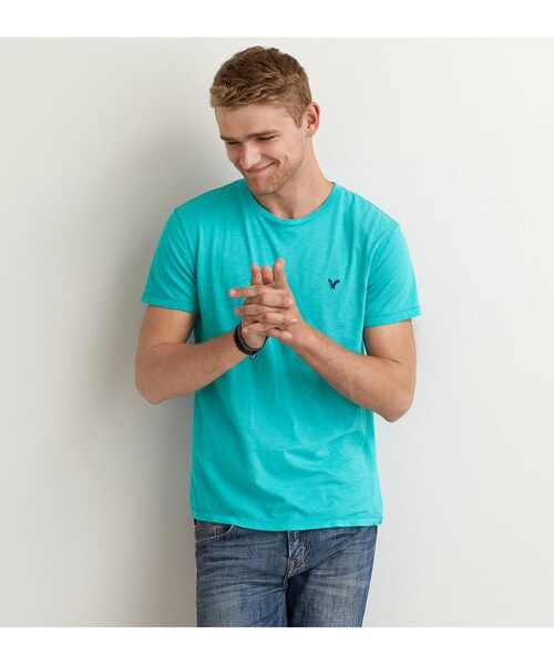 American Eagle(アメリカンイーグル)の「AEOレジェンドクルーネックTシャツ(Tシャツ/カットソー・メンズ・ブラックチェリー/アクア/ダスティセイジ/ライトピンク/オレンジエード/ウォッシュラピス/ディープシーダイブ・XS/S/M/L/XL/XXL/XXXL)」の1枚目の写真