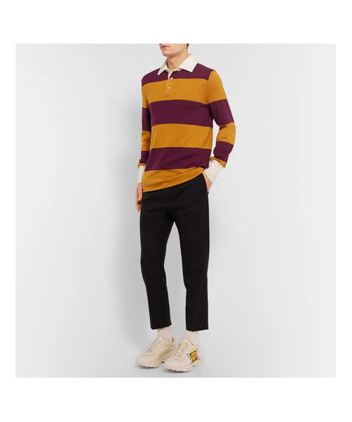 GUCCI（グッチ）の「Gucci Rhyton Printed Leather Sneakers（スニーカー・メンズ・White・Uk12/Uk13/Uk10.5/Uk11/Uk10/Uk9/Uk9.5/Uk8/Uk8.5/Uk7.5/Uk6.5/Uk7/Uk6）」の2枚目の写真