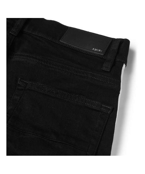 AMIRI（アミリ）の「AMIRI Track Skinny-Fit Striped Distressed