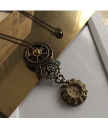 Handmade（ハンドメイド）の「歯車透ける二つの時計を繋ぐペンダント