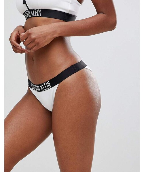 Calvin Klein（カルバン・クライン）の「Calvin Klein Brazilian Logo Bikini Bottom（水着）」 -  WEAR
