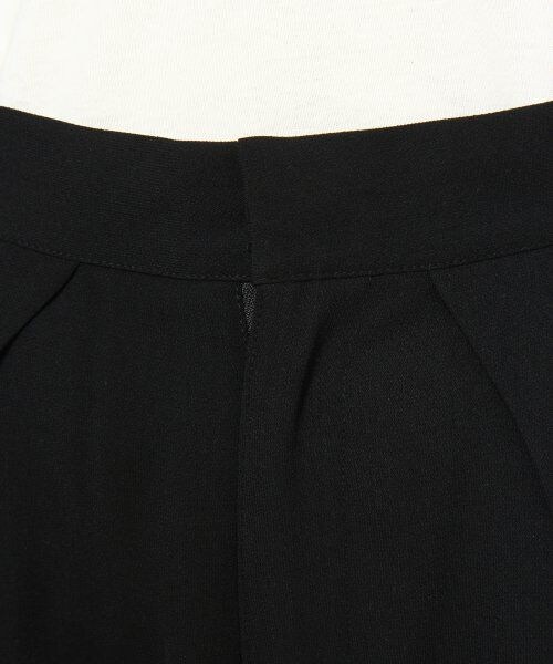 JEANASIS（ジーナシス）の「カサネタックスラウチパンツ（パンツ・レディース・アイボリー/オレンジ・S/M）」の4枚目の写真