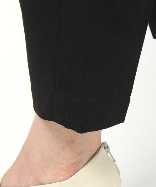 JEANASIS（ジーナシス）の「カサネタックスラウチパンツ（パンツ・レディース・アイボリー/オレンジ・S/M）」の6枚目の写真