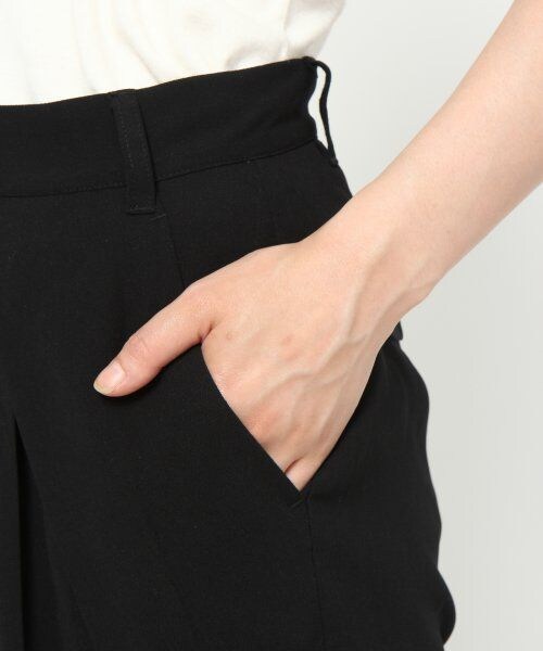 JEANASIS（ジーナシス）の「カサネタックスラウチパンツ（パンツ・レディース・アイボリー/オレンジ・S/M）」の5枚目の写真