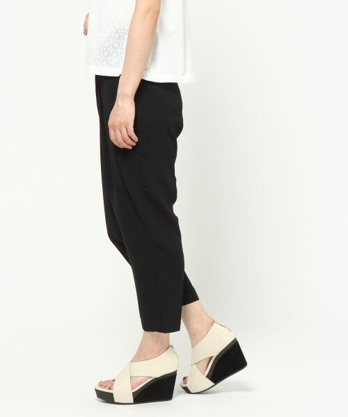 JEANASIS（ジーナシス）の「カサネタックスラウチパンツ（パンツ・レディース・アイボリー/オレンジ・S/M）」の2枚目の写真