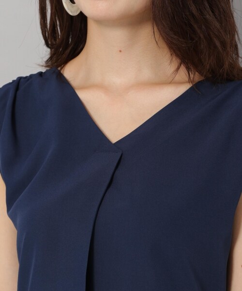 Andemiu(アンデミュウ)の「カタシャーリングブラウス(トップス・オフホワイト/オレンジ/ネイビー)」の11枚目の写真