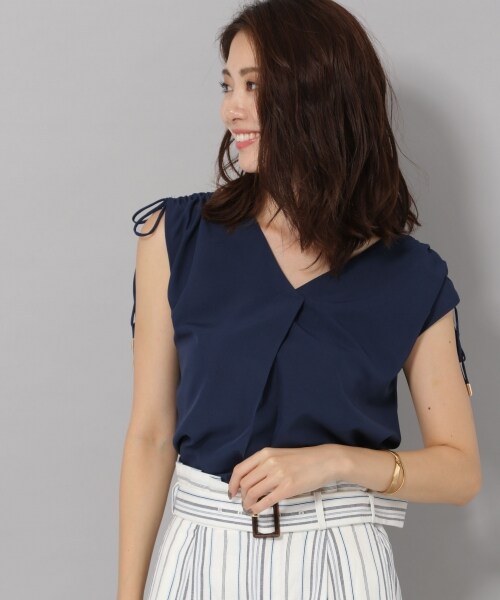 Andemiu(アンデミュウ)の「カタシャーリングブラウス(トップス・オフホワイト/オレンジ/ネイビー)」の3枚目の写真