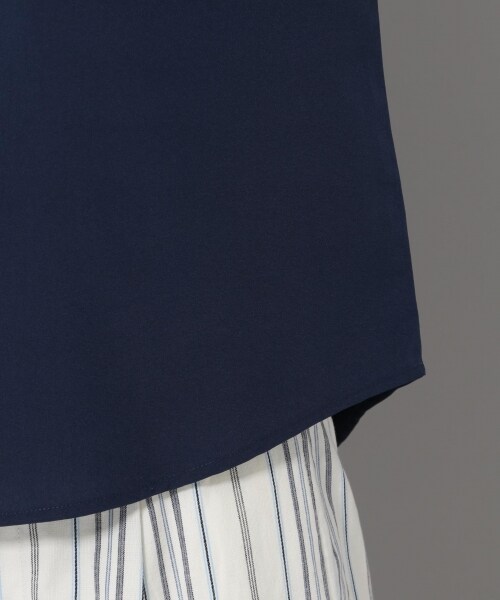 Andemiu(アンデミュウ)の「カタシャーリングブラウス(トップス・オフホワイト/オレンジ/ネイビー)」の13枚目の写真