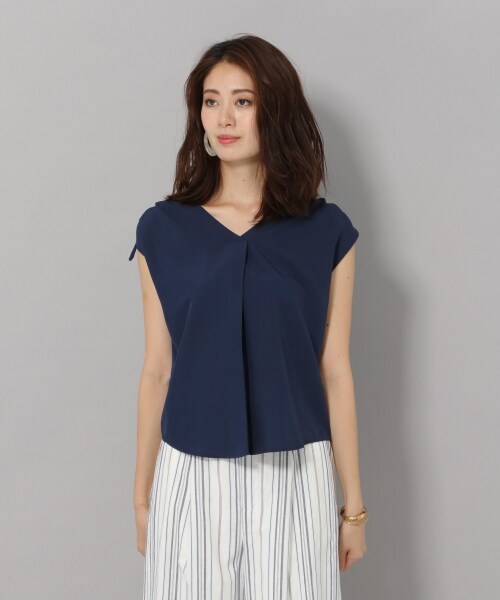 Andemiu(アンデミュウ)の「カタシャーリングブラウス(トップス・オフホワイト/オレンジ/ネイビー)」の7枚目の写真