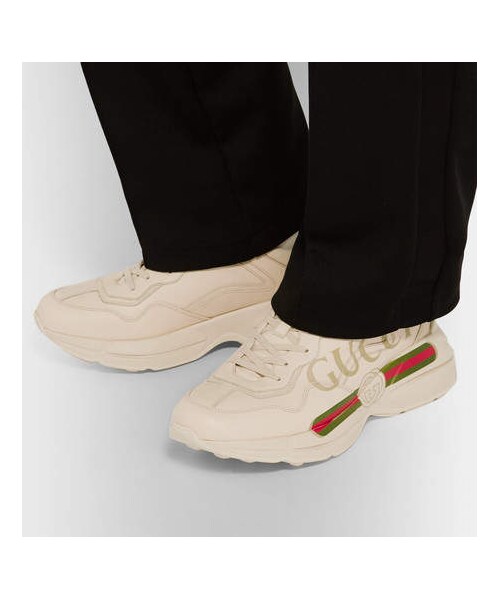 GUCCI(グッチ)の「Gucci Rhyton Logo-Print Leather Sneakers(スニーカー・メンズ・White・Uk11/Uk9/Uk12/Uk10/Uk9.5/Uk10.5)」の2枚目の写真