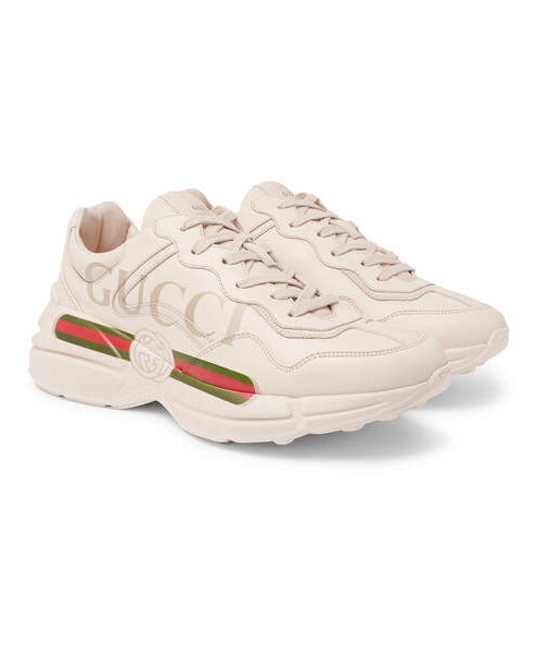 GUCCI(グッチ)の「Gucci Rhyton Logo-Print Leather Sneakers(スニーカー・メンズ・White・Uk11/Uk9/Uk12/Uk10/Uk9.5/Uk10.5)」の1枚目の写真