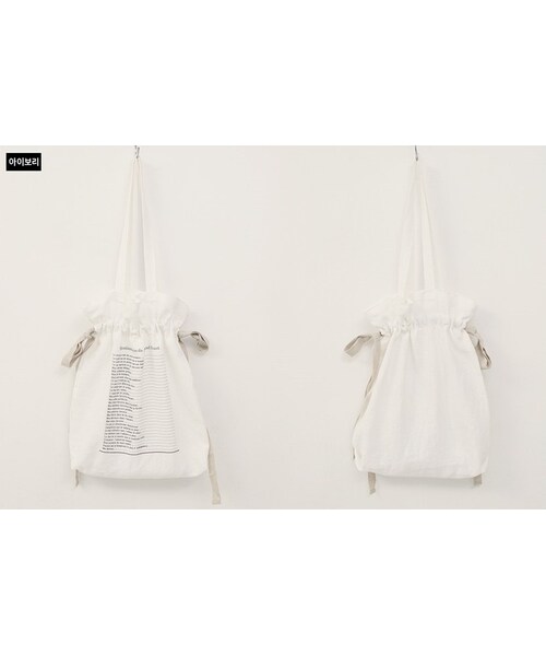 Dailyabout(デイリーアバウト)の「レタリングストリングトートバッグ(トートバッグ・レディース・ホワイト/ベージュ・FREE)」の1枚目の写真