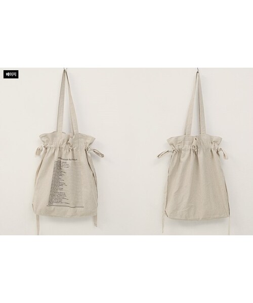 Dailyabout(デイリーアバウト)の「レタリングストリングトートバッグ(トートバッグ・レディース・ホワイト/ベージュ・FREE)」の2枚目の写真