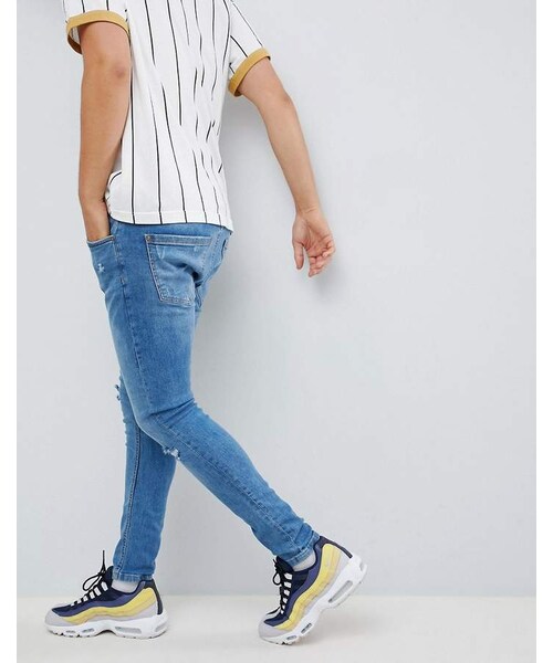 Bershka（ベルシュカ）の「Bershka Super Skinny Jeans In Blue With Knee Rips（デニムパンツ・メンズ・Blue・W31 L32/W29 L32/W30 L32/W34 L32/W32 L32/W36 L32/W28 L32）」の2枚目の写真