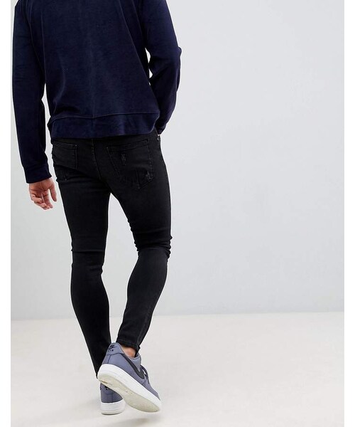 Bershka（ベルシュカ）の「Bershka Super Skinny Jeans With Knee Rips In Black（デニムパンツ・メンズ・Black・W30 L32/W31 L32/W32 L32/W28 L32/W29 L32）」の2枚目の写真