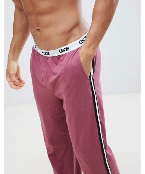 asos(エイソス)の「ASOS DESIGN straight leg jersey pyjama bottom in burgundy with branded waistband(デニムパンツ・メンズ・Red・M/XL/XXXL/XXS/S/XS/XXL/L)」の2枚目の写真