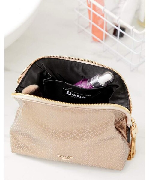 Dune（ドゥーン）の「Dune makeup bag in rose gold（メイクブラシ）」 WEAR