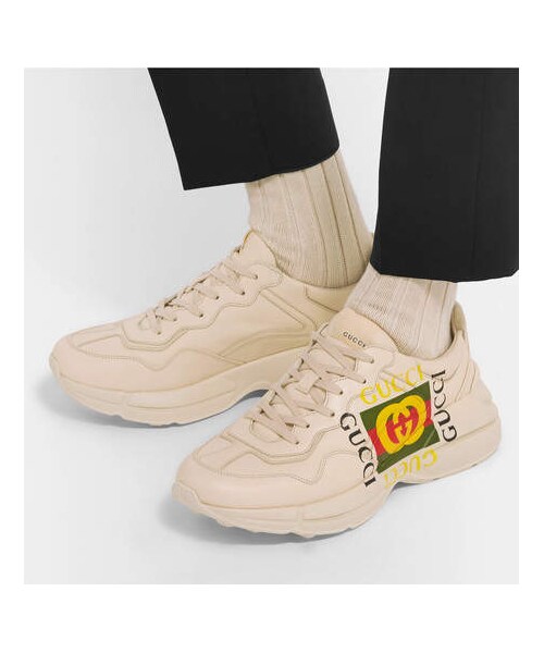 GUCCI（グッチ）の「Gucci Rhyton Logo-Print Leather Sneakers（スニーカー・メンズ・White・Uk7/Uk10.5/Uk8/Uk7.5/Uk11/Uk6.5/Uk10/Uk9/Uk9.5/Uk8.5）」の2枚目の写真