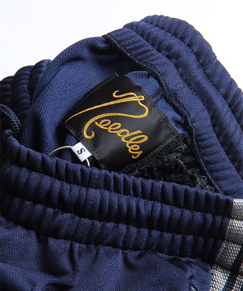 Needles(ニードルス)の「別注Papillon Emb Side Line Track Pant(パンツ・メンズ・ネイビー/パープル・S/M)」の8枚目の写真