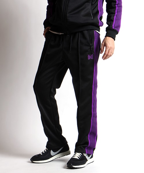 Needles(ニードルス)の「別注Papillon Emb Side Line Track Pant(パンツ・メンズ・ネイビー/パープル・S/M)」の2枚目の写真