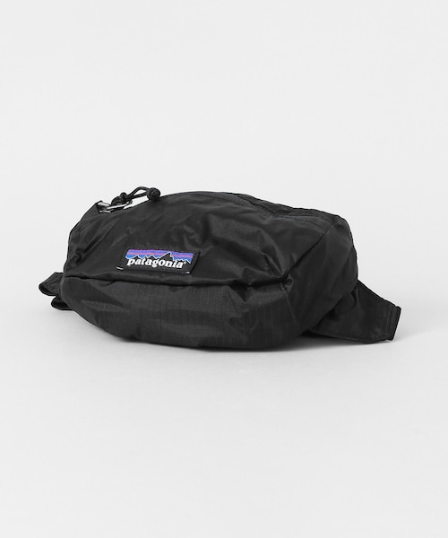 patagonia(パタゴニア)の「patagonia Travel Mini Hip pack(バッグ・レディース・BLK/CNMO/TTPS/REYE/PARC・one)」の7枚目の写真