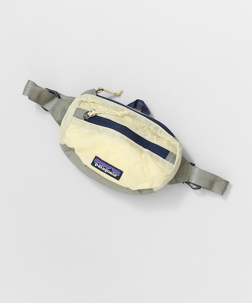 patagonia(パタゴニア)の「patagonia Travel Mini Hip pack(バッグ・レディース・BLK/CNMO/TTPS/REYE/PARC・one)」の5枚目の写真