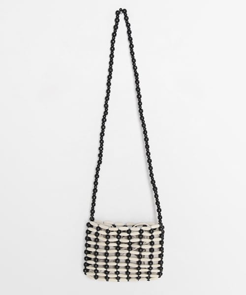 DHOLIC（ディーホリック）の「巾着SETウッドビーズショルダーバッグ（ショルダーバッグ・レディース・ベージュ/ブラック・FREE）」の2枚目の写真