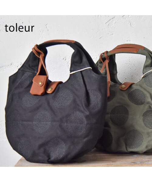 toleur（トーラ）の「toleur キャンバス ドット刺繍 ミニトートバッグ