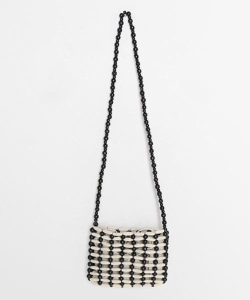 DHOLIC(ディーホリック)の「巾着SETウッドビーズショルダーバッグ(ショルダーバッグ・レディース・ブラック/ベージュ・FREE)」の1枚目の写真