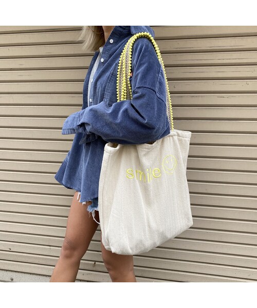 no brand(ノーブランド)の「ぽんぽんトートバッグ「smile」(トートバッグ・レディース・その他)」の4枚目の写真