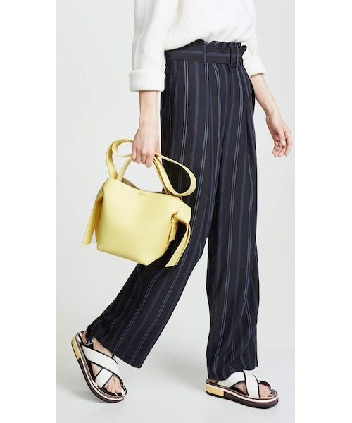 Acne Studios（アクネストゥディオズ）の「Acne Studios Musubi Mini Bag（ショルダーバッグ・レディース・Yellow・One Size）」の5枚目の写真