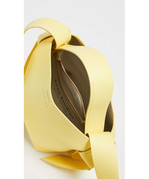 Acne Studios（アクネストゥディオズ）の「Acne Studios Musubi Mini Bag（ショルダーバッグ・レディース・Yellow・One Size）」の3枚目の写真