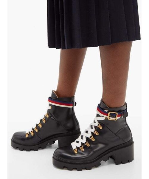 GUCCI(グッチ)の「Gucci - Trip Leather Boots - Womens - Black(ブーツ・レディース・Black・34 Eu/it/34.5 Eu/it/35 Eu/it/35.5 Eu/it/36 Eu/it/36.5 Eu/it/37 Eu/it/37.5 Eu/it/38 Eu/it/38.5 Eu/it/39 Eu/it/39.5 Eu/it/40 Eu/it/40.5 Eu/it/41 Eu/it/41.5 Eu/it/42 Eu/it)」の5枚目の写真