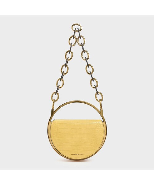 CHARLES & KEITH(チャールズ & キース)の「クロックエフェクト サーキュラーバッグ / Croc-Effect Circular Bag (Yellow)(バッグ・レディース・Yellow・S/FREE)」の1枚目の写真