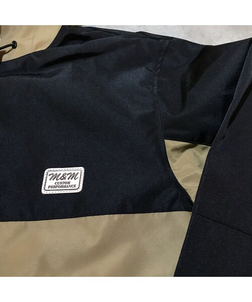 M&M（エムアンドエム）の「M&M - SWITCHING SHELL HOODIE (ブラック 