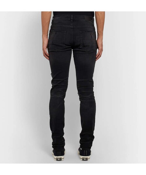 AMIRI（アミリ）の「Amiri Mx1 Skinny-Fit Panelled Distressed Stretch-Denim Jeans（デニムパンツ・メンズ・Black・Uk/us 28/Uk/us 29/Uk/us 30/Uk/us 31/Uk/us 32/Uk/us 33/Uk/us 34）」の3枚目の写真