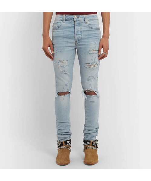 AMIRI（アミリ）の「Amiri Thrasher Plus Skinny-Fit Distressed Stretch-Denim Jeans（デニムパンツ・メンズ・Blue・Uk/us 28/Uk/us 29/Uk/us 30/Uk/us 31/Uk/us 32/Uk/us 33/Uk/us 34）」の2枚目の写真