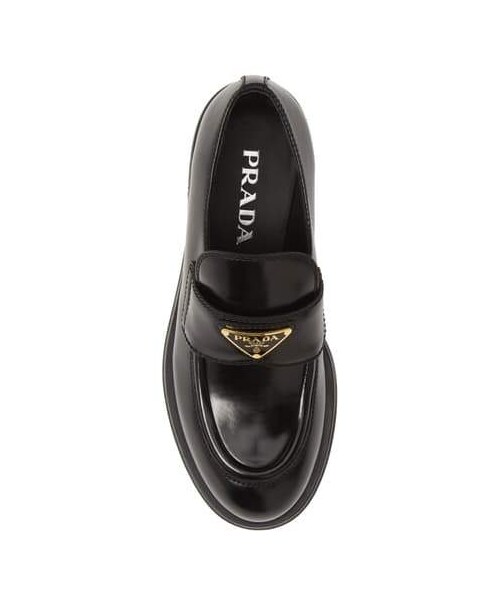 PRADA（プラダ）の「Prada Logo Penny Loafer（シューズ・レディース・Black・7us / 37eu/7.5us / 37.5eu/6us / 36eu/8.5us / 38.5eu/8us / 38eu/9us / 39eu/9.5us / 39.5eu/10us / 40eu）」の2枚目の写真