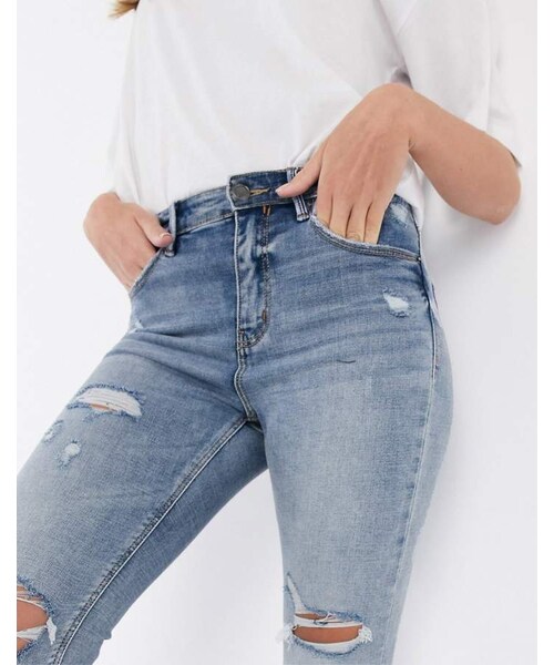 stradivarius（ストラディバリウス）の「Stradivarius high waist skinny jeans with rips in medium wash（デニムパンツ・レディース・Blue・34/36）」の4枚目の写真
