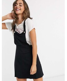 asos | Asos Design ASOS DESIGN mini pinafore skirt with buttons in black (スカート)