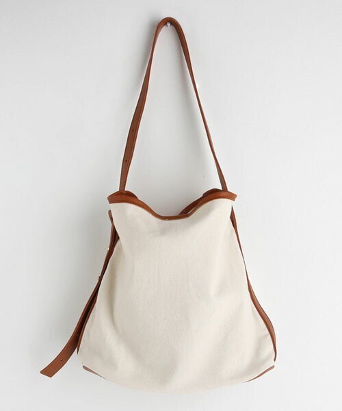 DHOLIC（ディーホリック）の「レザー調ラインコットンバッグ（ショルダーバッグ・レディース・ブラック/ブラウン・FREE）」の2枚目の写真