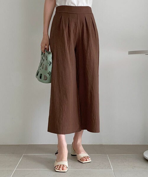 DHOLIC(ディーホリック)の「タックコットンワイドパンツ(その他パンツ・レディース・ブラウン/イエロー/ブラック/ベージュ/ホワイト・FREE)」の1枚目の写真