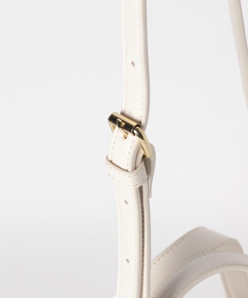 LEPSIM（レプシィム）の「フェイクレザーパンチングＢＡＧ（バッグ・オフ/ブラウン/ネイビー）」の10枚目の写真