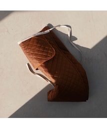 Y.A.Acc（ワイエーアク）の「quilting pocket wrap skirt CAMEL（スカート）」